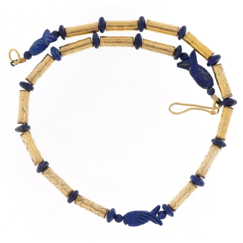 2073 - Egyptian style unmarked gold bead and carved lapis lazuli necklace, tests as 14ct gold, total 29.8g