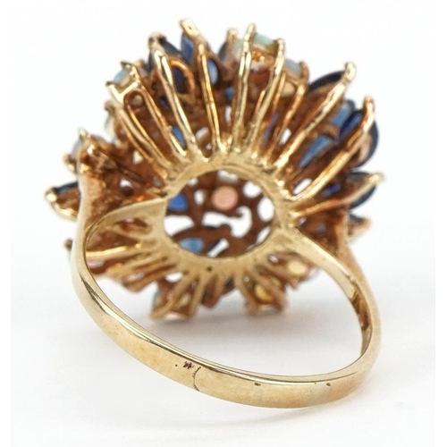 2187 - Gold sapphire and cabochon opal cocktail ring, the band indistinctly marked, tests as 9ct gold, size... 