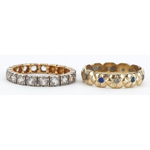 2189 - Two unmarked gold eternity rings set with clear and blue stones, test as 9ct gold, sizes N and L, to... 