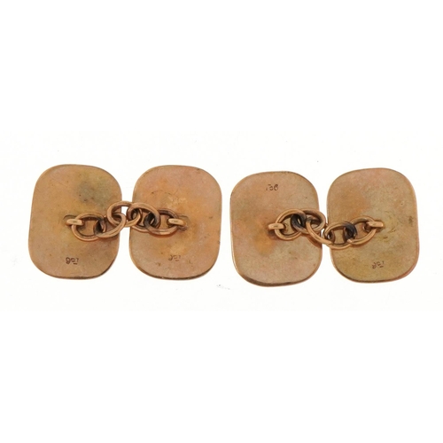 2238 - Pair of 9ct gold cufflinks with engine turned decoration, 1.4cm wide, 3.2g