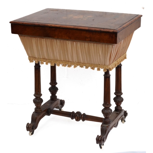 1010 - Victorian walnut workbox, the crossbanded lift up top with floral inlaid panel on fluted legs, 78cm ... 