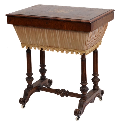 1010 - Victorian walnut workbox, the crossbanded lift up top with floral inlaid panel on fluted legs, 78cm ... 