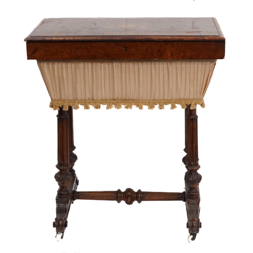 1010 - Victorian walnut workbox, the crossbanded lift up top with floral inlaid panel on fluted legs, 78cm ... 