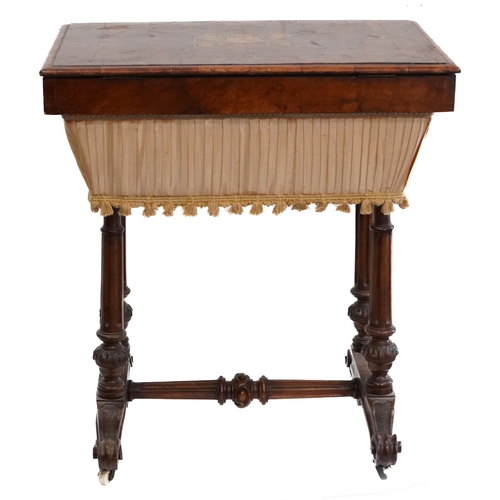 1010 - Victorian walnut workbox, the crossbanded lift up top with floral inlaid panel on fluted legs, 78cm ... 