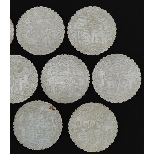 184 - Ten good Chinese Canton mother of pearl gaming counters finely carved with figures amongst pavilions... 