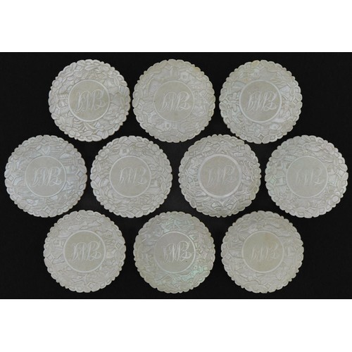 184 - Ten good Chinese Canton mother of pearl gaming counters finely carved with figures amongst pavilions... 