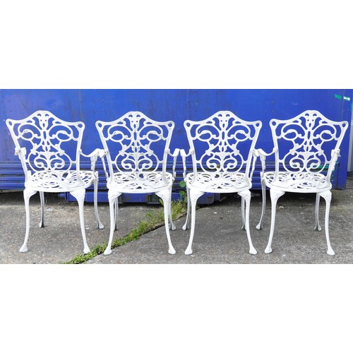 1142 - White painted aluminium garden table and four chairs, the table 67cm high x 87cm in diameter