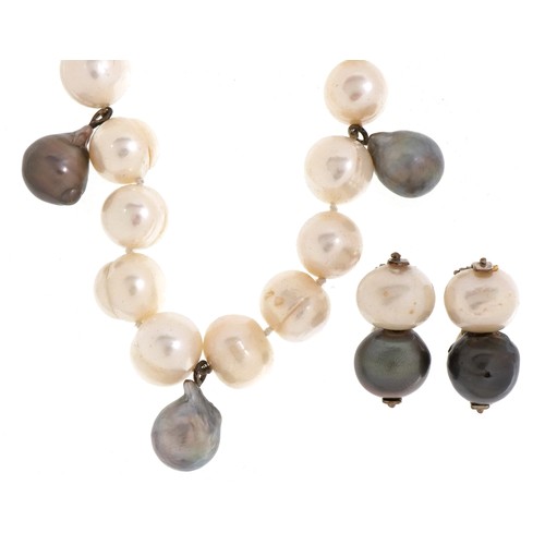 2083 - Freshwater Baroque pearl necklace with silver clasp and matching earrings, the necklace 44cm in leng... 