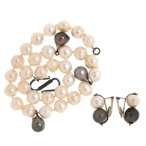 2083 - Freshwater Baroque pearl necklace with silver clasp and matching earrings, the necklace 44cm in leng... 