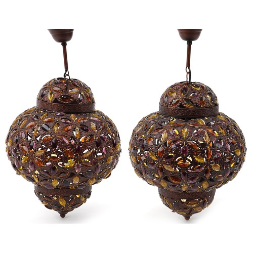 116 - Pair of Moroccan bronzed light pendants with coloured glass beads, 50cm high