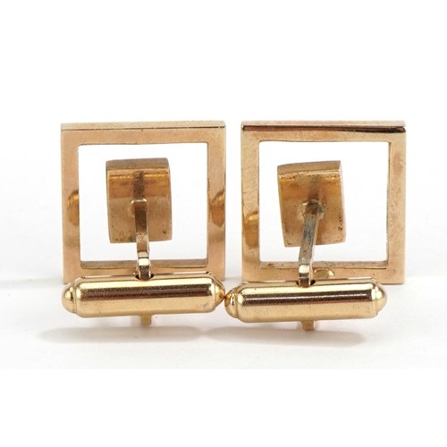 2038 - Pair of Art Deco style yellow metal and green stone cufflinks, 1.6cm high, 9.9g