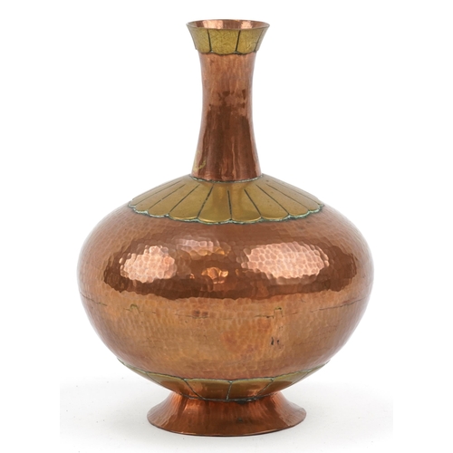 750 - Arts & Crafts style planished copper and brass vase, 15cm high