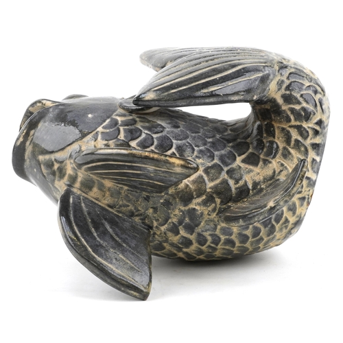 728 - Continental pottery vase in the form of a stylised fish, 28cm high