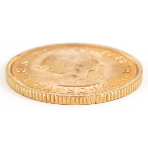 56 - Elizabeth II 1962 gold sovereign - this lot is sold without buyer’s premium, the hammer price is the... 