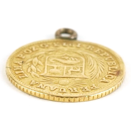 28 - Peruvian 1/5th libra gold coin with suspension loop - this lot is sold without buyer’s premium, the ... 
