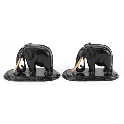 731 - Pair of African carved ebony elephants, each 13cm in length