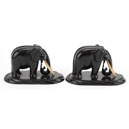 731 - Pair of African carved ebony elephants, each 13cm in length