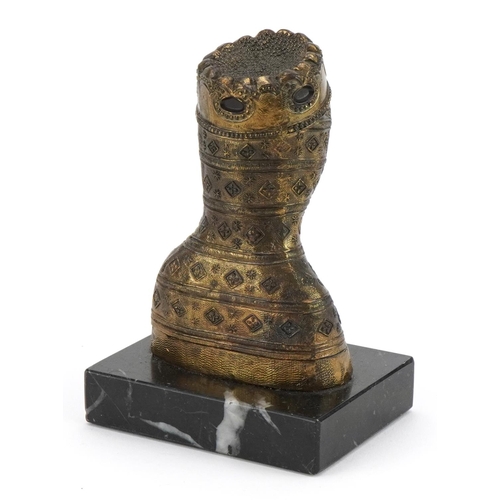 457 - Religious interest partially lacquered gilt metal stylised bust of Madonna raised on a rectangular b... 