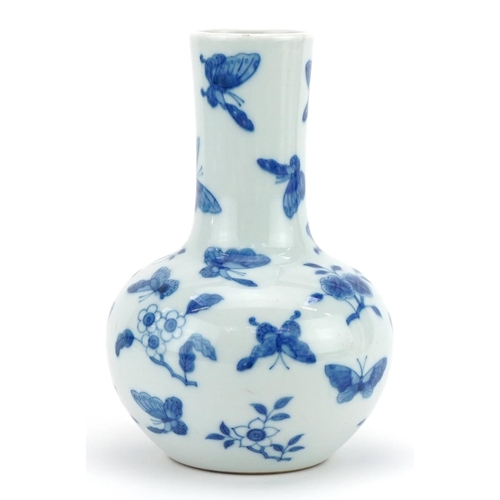 397 - Chinese blue and white porcelain vase hand painted with butterflies amongst flowers, four figure cha... 