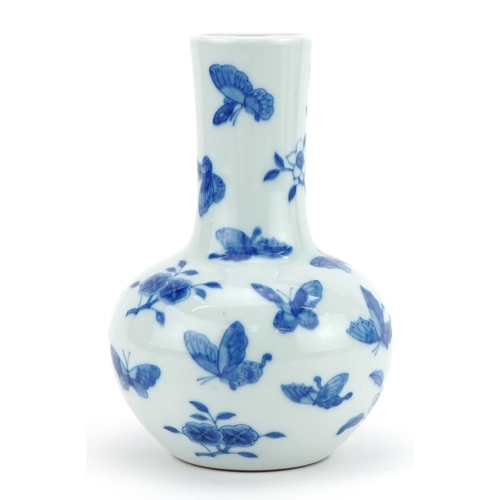 397 - Chinese blue and white porcelain vase hand painted with butterflies amongst flowers, four figure cha... 