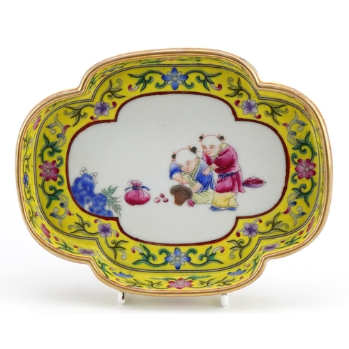 400 - Chinese porcelain four footed dish with yellow ground border hand painted in the famille rose palett... 