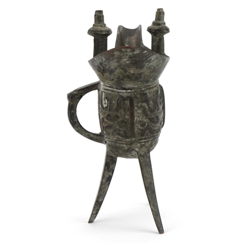 507 - Chinese archaic style patinated bronze wine vessel, 15.5cm high