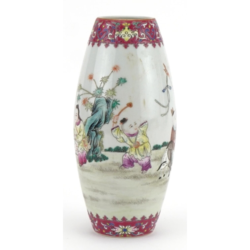 500 - Chinese porcelain vase finely hand painted in the famille rose palette with children playing and goa... 