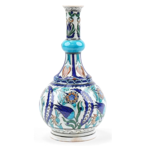 163 - Turkish Iznik pottery vase hand painted with stylised flowers, 37cm high