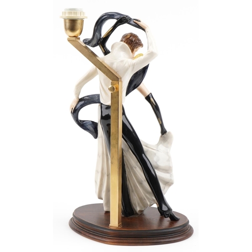 555 - After Amilcare Santini, Art Deco style hand painted figural table lamp in the form of two tango danc... 