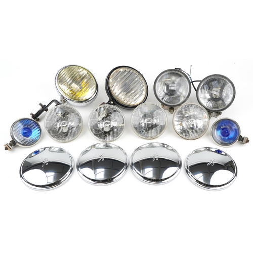 413 - Collection of vintage car headlamps including Lucas, Nearlite and Fog Master together with a set of ... 