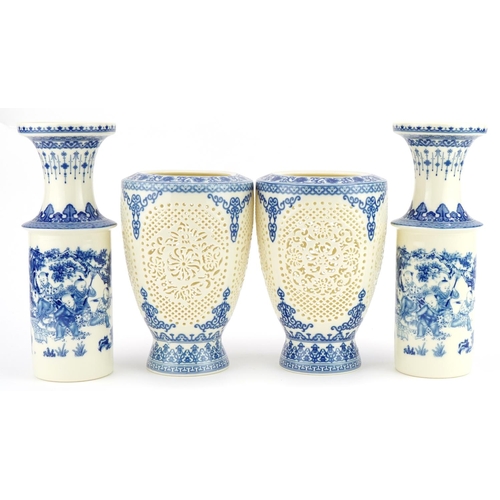 709 - Pair of Chinese blue and white porcelain reticulated two piece flower vases decorated with flowers a... 