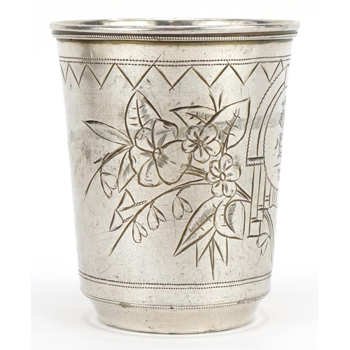 575 - Silver beaker engraved with flowers, impressed Russian marks to the base, 7.5cm high, 70.2g