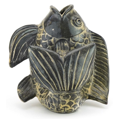 728 - Continental pottery vase in the form of a stylised fish, 28cm high