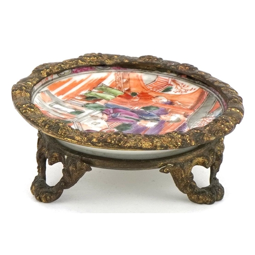 585 - Chinese Mandarin porcelain dish hand painted with figures with three footed gilt metal stand and rim... 