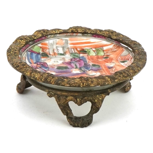 585 - Chinese Mandarin porcelain dish hand painted with figures with three footed gilt metal stand and rim... 