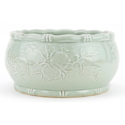 448 - Chinese porcelain celadon glazed bowl with faux bamboo borders decorated in low relief with peach tr... 