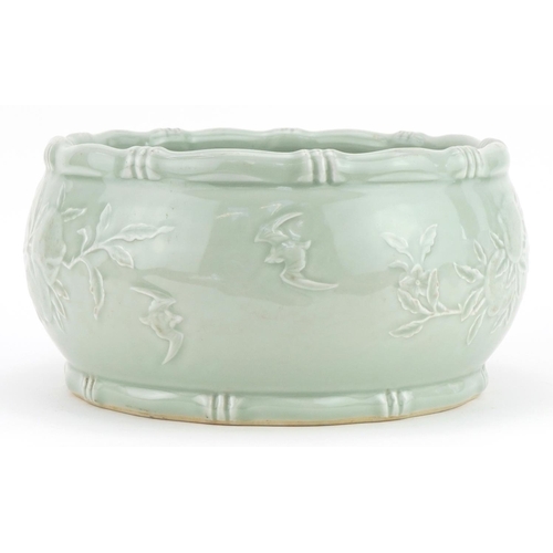 448 - Chinese porcelain celadon glazed bowl with faux bamboo borders decorated in low relief with peach tr... 