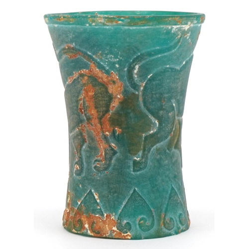 280 - Chinese archaic style turquoise glass beaker decorated with mythical animals, 10.5cm high