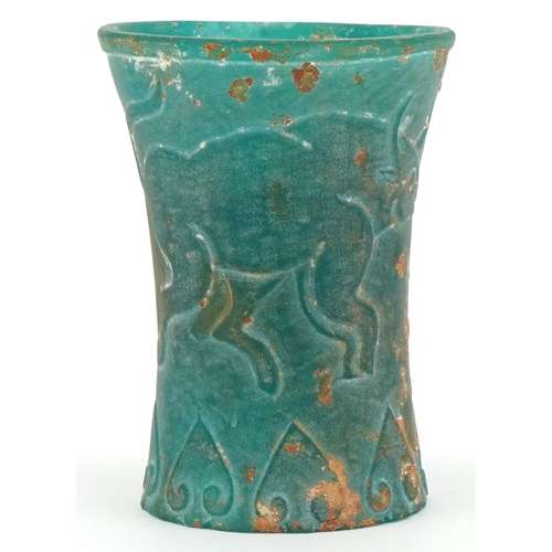 280 - Chinese archaic style turquoise glass beaker decorated with mythical animals, 10.5cm high