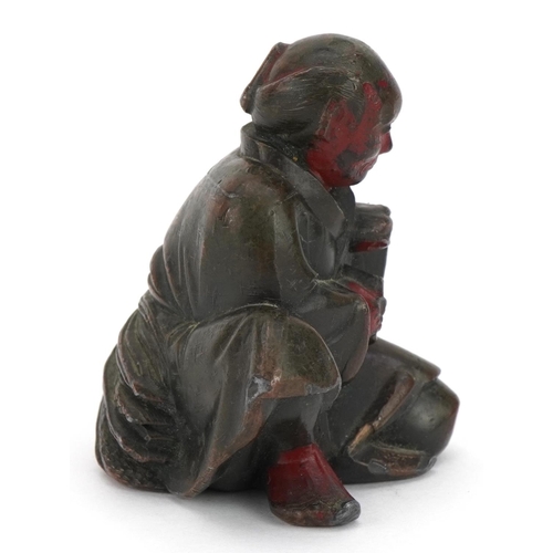 768 - Japanese antimony partially lacquered okimono of an figure with wheat, 7cm high