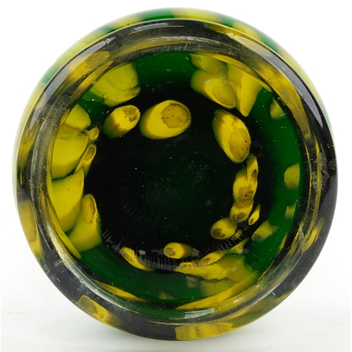 712 - Large green and yellow art glass vase with white trailed decoration, 46cm high