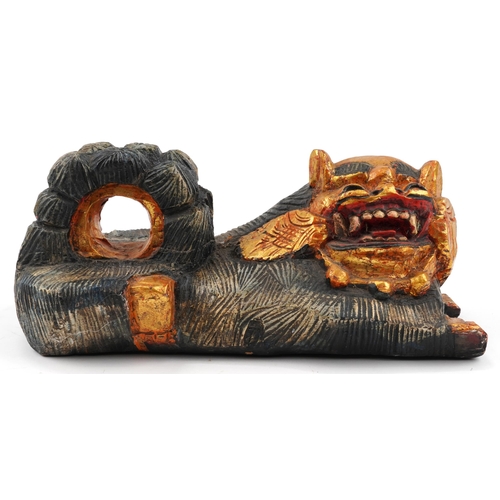 775 - Chinese painted carved wood recumbent lion, 48cm in length