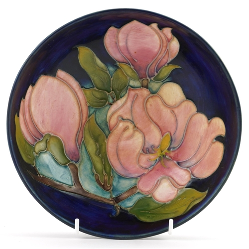 178 - Moorcroft pottery bowl hand painted in the Magnolia pattern, 21.5cm in diameter