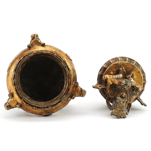 1399 - Chinese gilt bronze tripod incense burner with figural lid, 21cm high