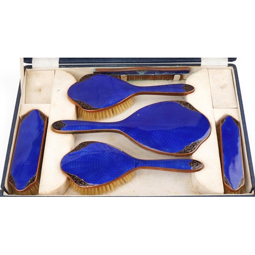 382 - Early 20th century brass blue guilloche and black enamel foliate dressing table set with fitted case... 