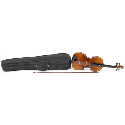 653 - Old wooden violin with bow having mother of pearl frog and case, the violin back 14.25 inches in len... 