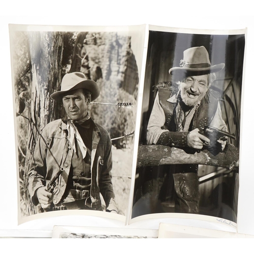 1761 - Vintage western film lobby cards and two comics, some lobby cards with Fox Films stamps to the rever... 