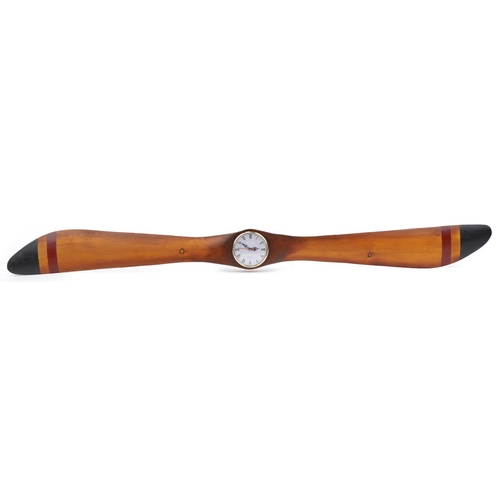 2698 - Military interest hardwood propeller design wall clock with Roman numerals, 152cm in length