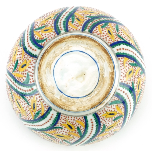 67 - Turkish Ottoman Kutahya pottery bowl hand painted with stylised flowers, 19.5cm in diameter