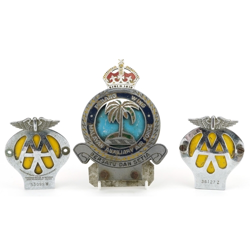 1398 - Three vintage automobilia interest car badges comprising Malayan Auxiliary Air Force Penang Wing and... 